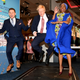 UK PM Boris Johnson visits the Pavegen stand, a company that converts footsteps into energy, at the Innovation Zone during the UK-Africa Investment Summit